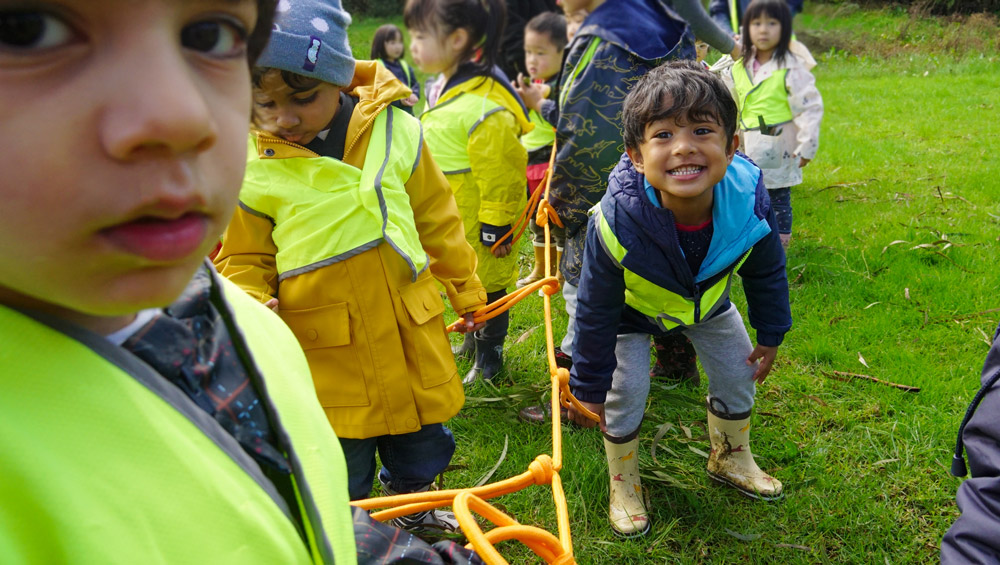 Group of kids wearing luminous jacket